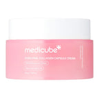 A jar of medicube PDRN Pink Collagen Capsule Cream, featuring a soft pink body and a white lid, set against a plain white background.